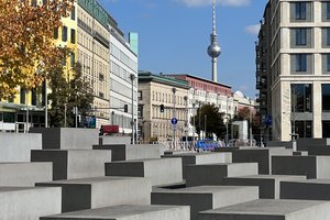 A group of concrete blocks in the middle of a city.
