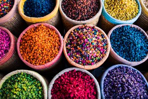 Colorful seeds in baskets on a market in morocco.